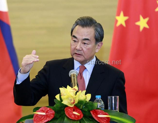 王毅抵达香港：见证国际调解院新时代的开启